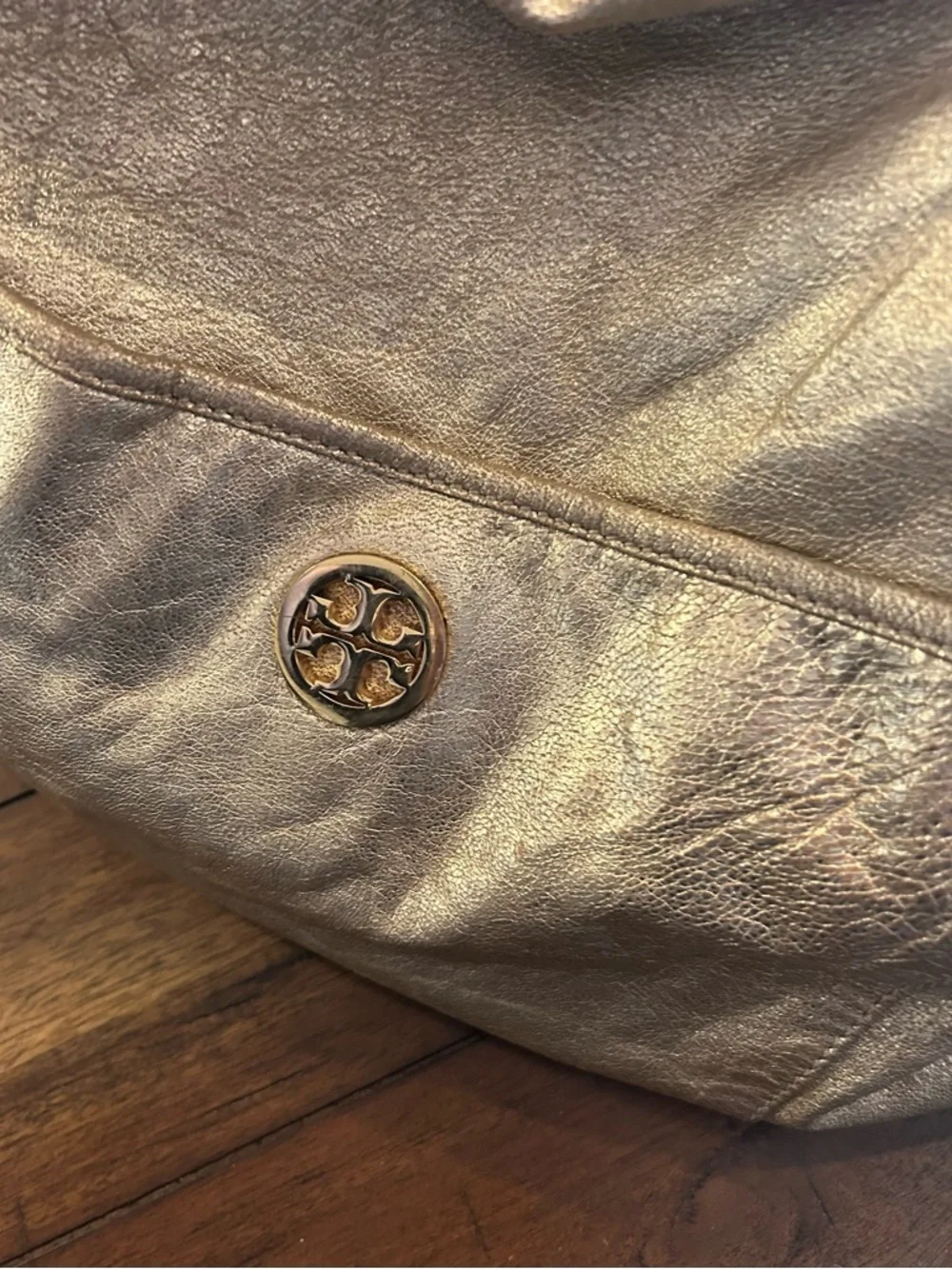 The Tory Burch Shimmer Gold Dean Hobo Bag MSRP 590.00